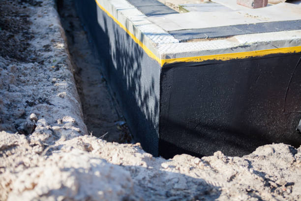 Professional Waterproofing technician working in McLean, VA